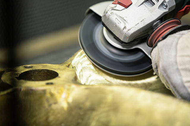 Reclamation grinding of a bronze ship propeller