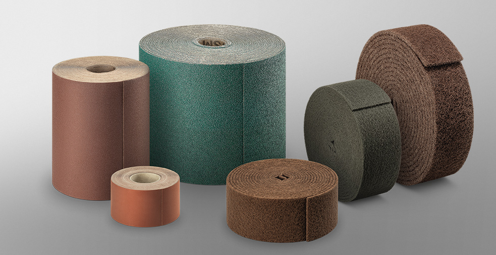 Abrasives on rolls for use in off-hand grinding and on power tools
